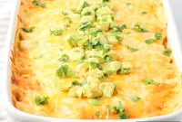 Creamy Chicken Enchiladas Recipe with Melted Cheese and Sauce