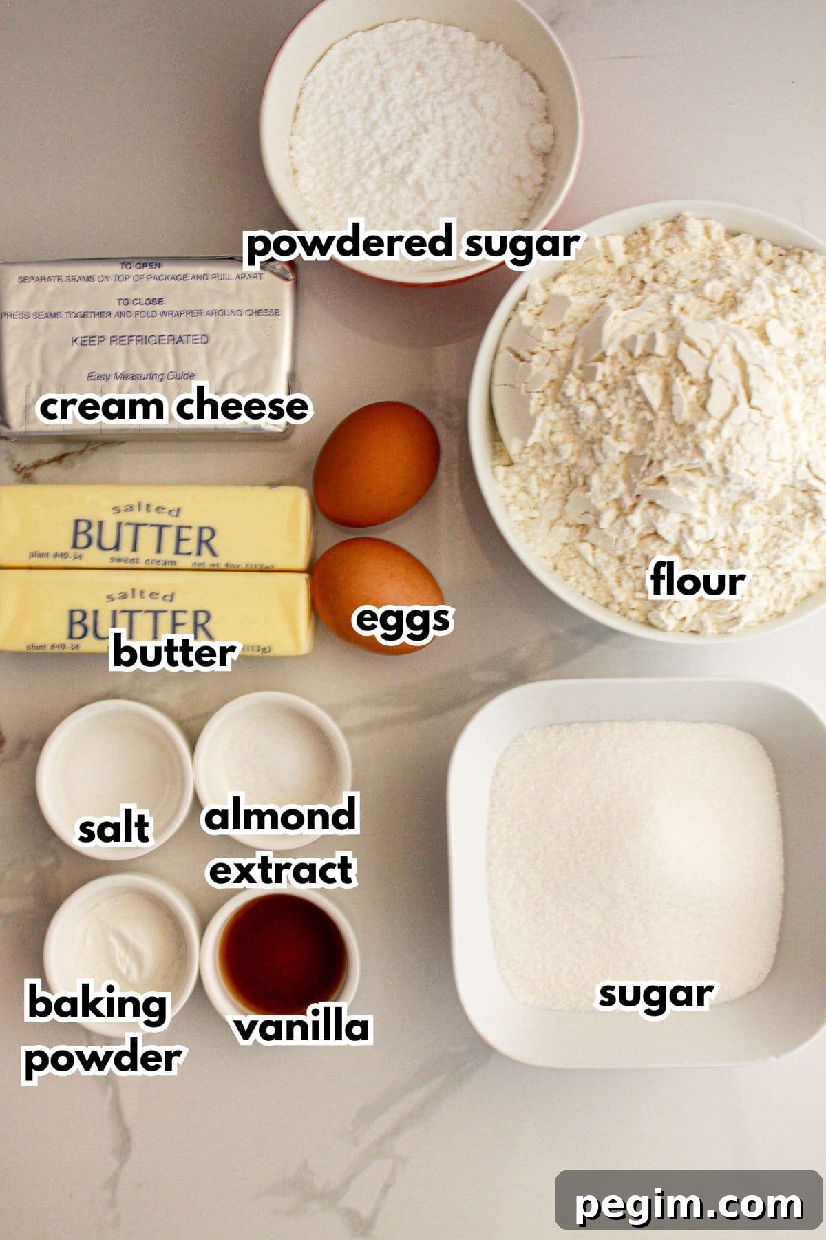 Bowls of ingredients on a counter labelled with text.