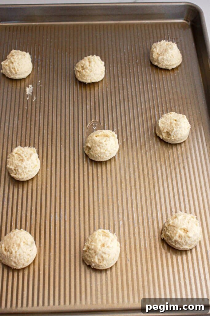 Dough balls on a baking sheet.