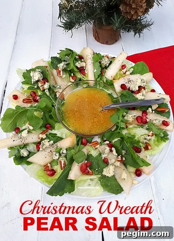Christmas Wreath Pear Salad is a refreshing salad addition to your Christmas menu, with pears, nuts, pomegranates and more - Prepping to serving within minutes