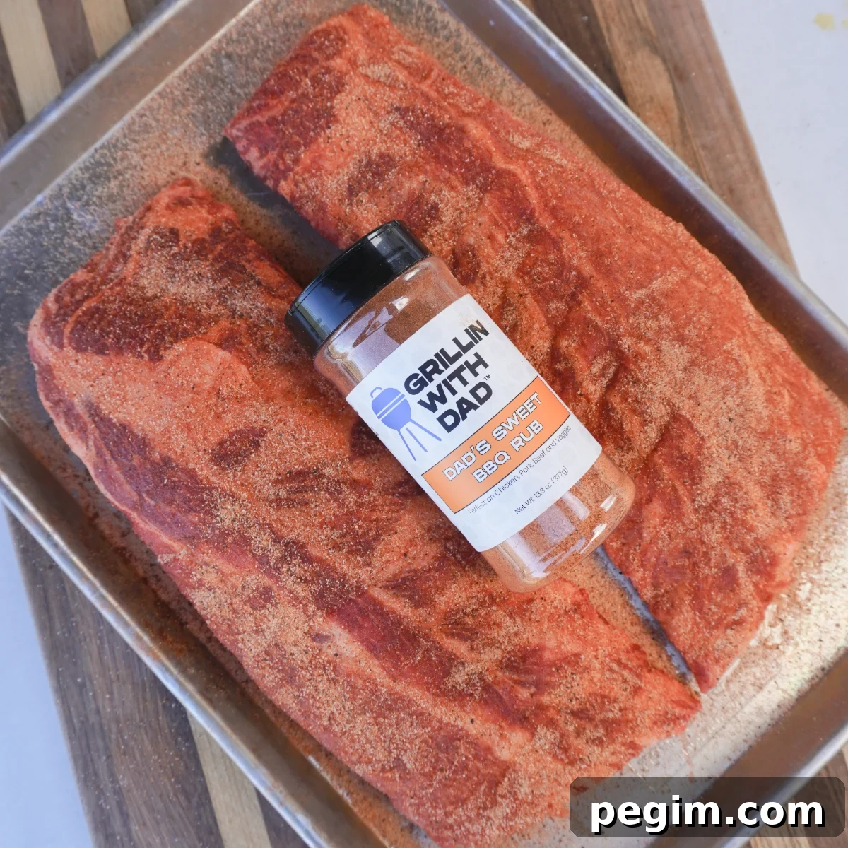 Seasoned ribs on a cutting board