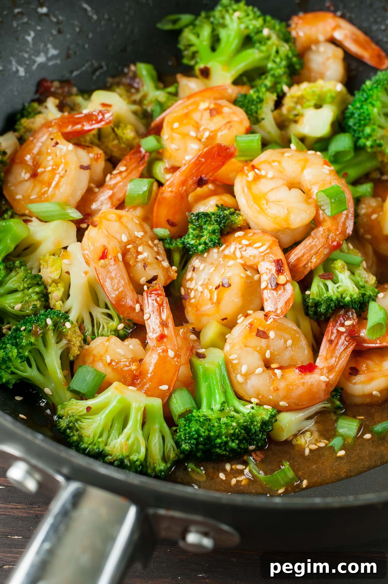 This copycat Szechuan Shrimp and Broccoli recipe is ridiculously tasty and ready in just 20 minutes. Skip the restaurant and whip up this healthy dish at home!