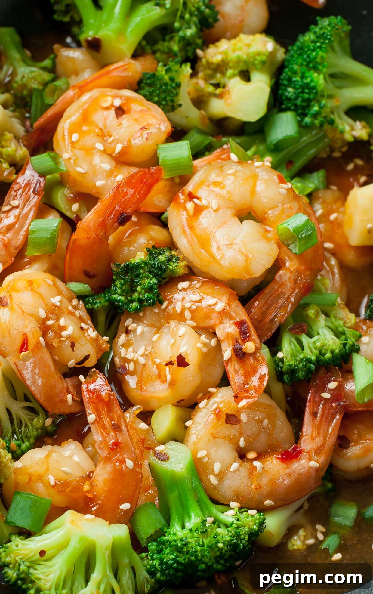 This copycat Szechuan Shrimp and Broccoli recipe is ridiculously tasty and ready in just 20 minutes. Skip the restaurant and whip up this healthy dish at home!
