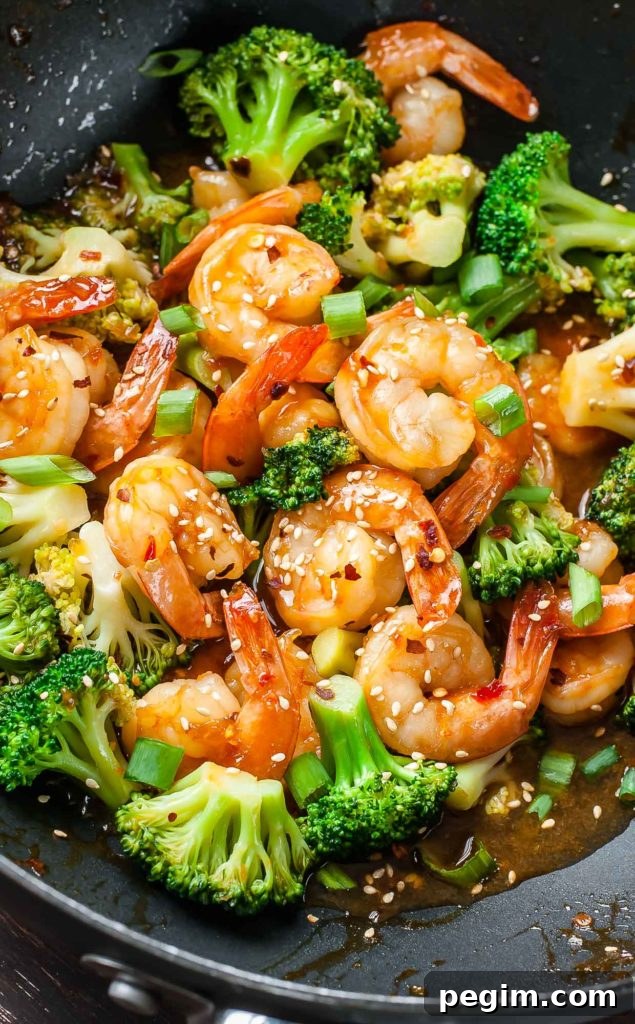 This copycat Szechuan Shrimp and Broccoli recipe is ridiculously tasty and ready in just 20 minutes. Skip the restaurant and whip up this healthy dish at home!