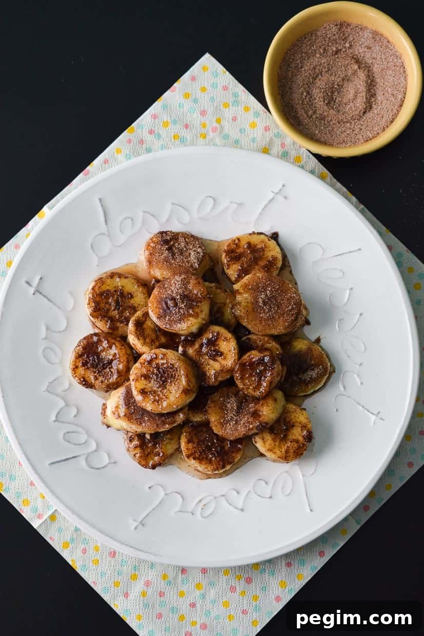 Banana Churros on white plate overhead shot