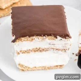 close up shot of a slice of Eclair Cake on a plate
