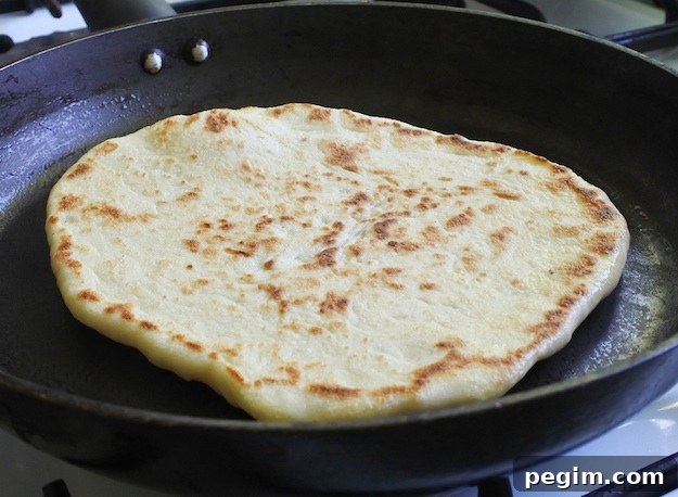 Easy, 3 Ingredient, healthy Paleo Flatbread Recipe made with almond flour, tapioca flour and coconut milk. Use it as a wrap or for mini pizzas! | Instrupix.com 