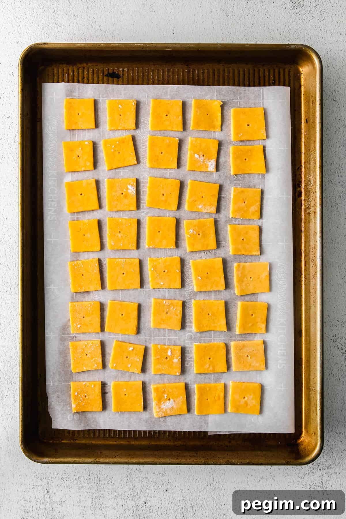 Cheez its sliced in baking sheet.