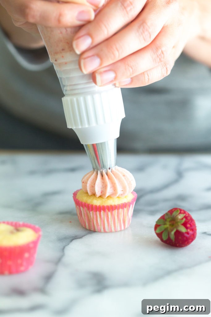 piping frosting with an ope star tip