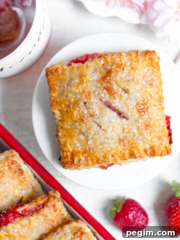 Strawberry Rhubarb Hand Pies with Pink Peppercorn Crust