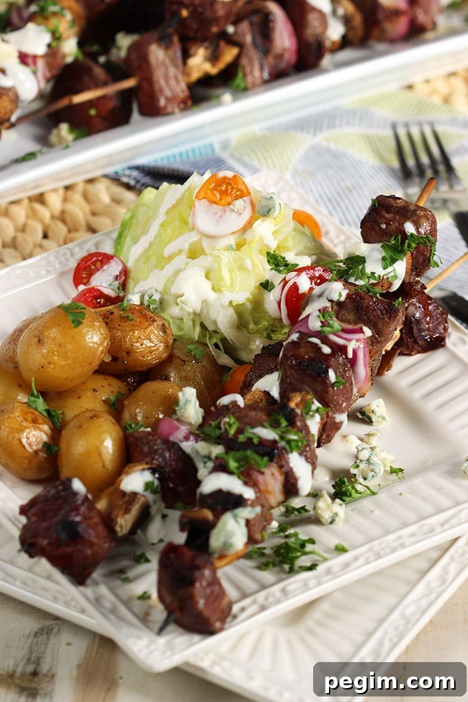 Quick and easy, Grilled Steak and Mushroom Kabobs with Blue Cheese Dressing is the perfect summer dinner for busy weeknights! | TheSuburbanSoapbox.com