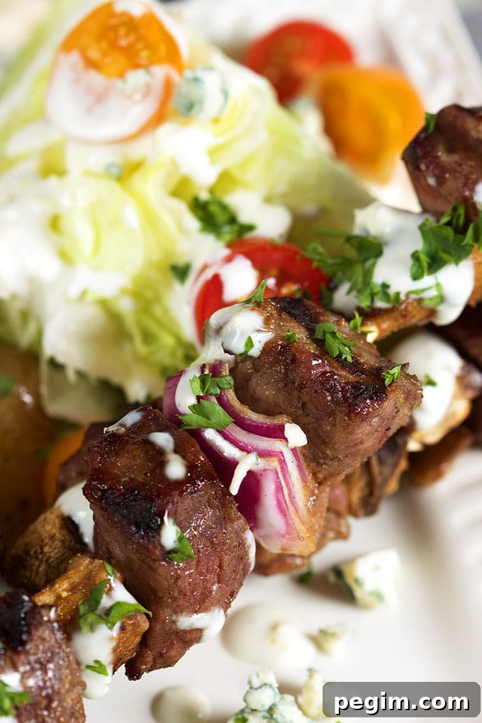 Quick and easy, Grilled Steak and Mushroom Kabobs with Blue Cheese Dressing is the perfect summer dinner for busy weeknights! | TheSuburbanSoapbox.com