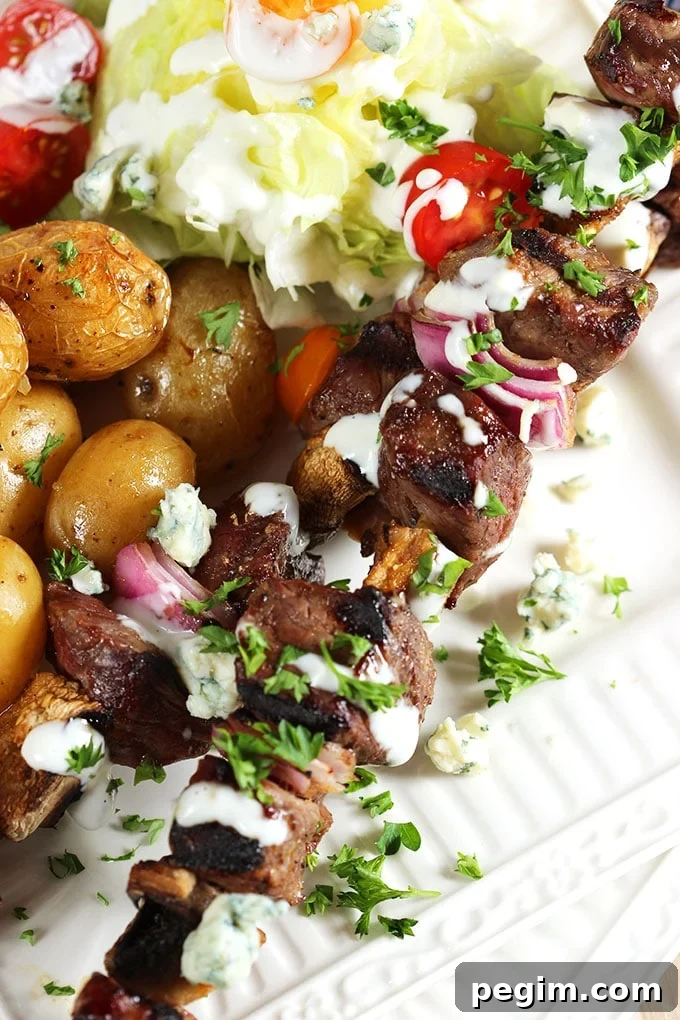 Quick and easy, Grilled Steak and Mushroom Kabobs with Blue Cheese Dressing is the perfect summer dinner for busy weeknights! | TheSuburbanSoapbox.com