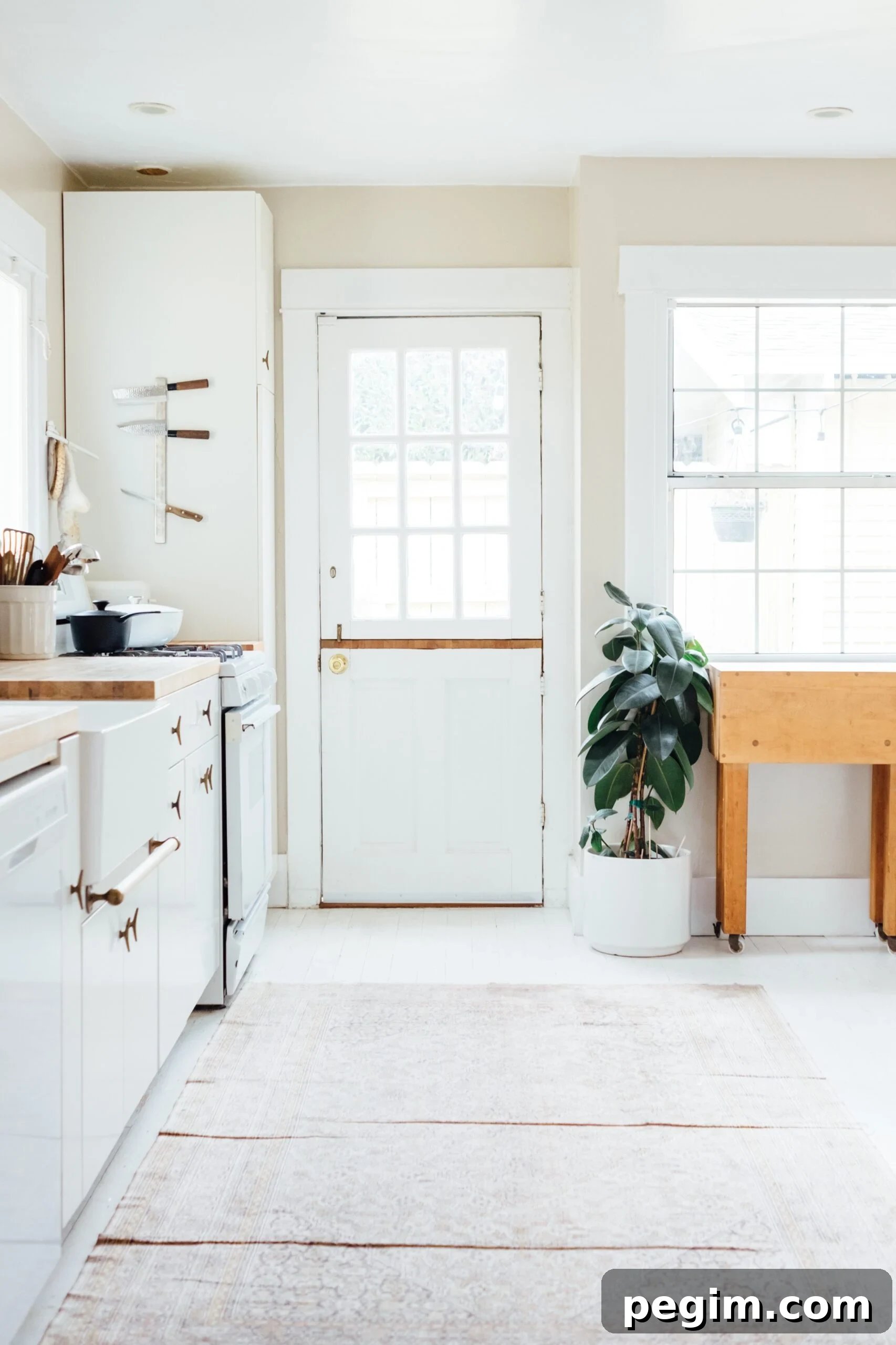 image of white and bright kitchen with boho flair 