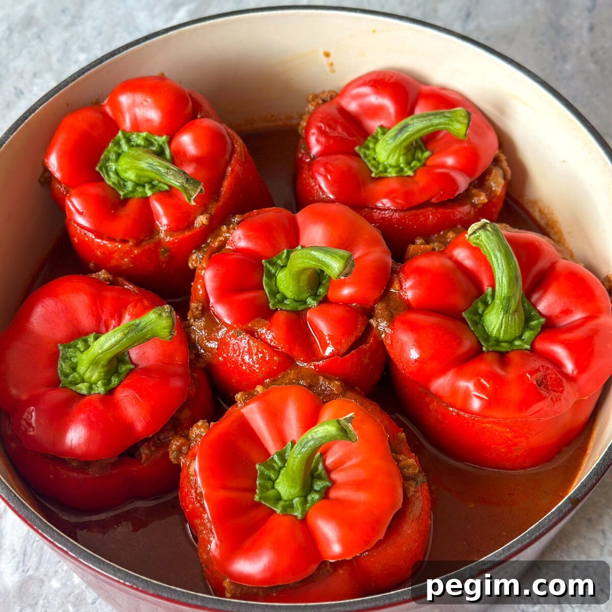 Pour our sauce overtop & place the lids on!