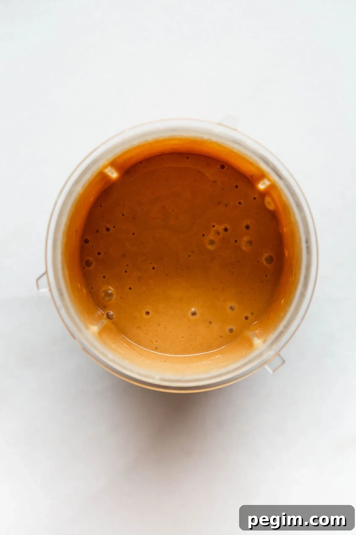 Peanut butter dressing in a magic bullet container.