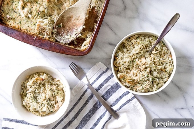 Two bowls of chicken and rice casserole on a table.
