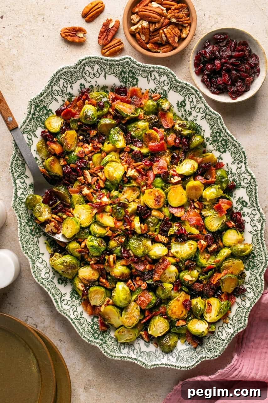maple bacon brussels sprouts with pecans on a platter