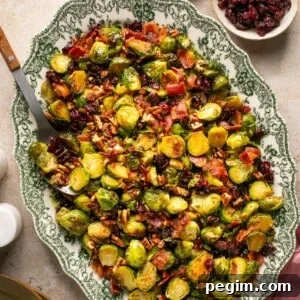 maple bacon brussels sprouts with pecans on a platter