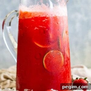 A pitcher of strawberry lemonade