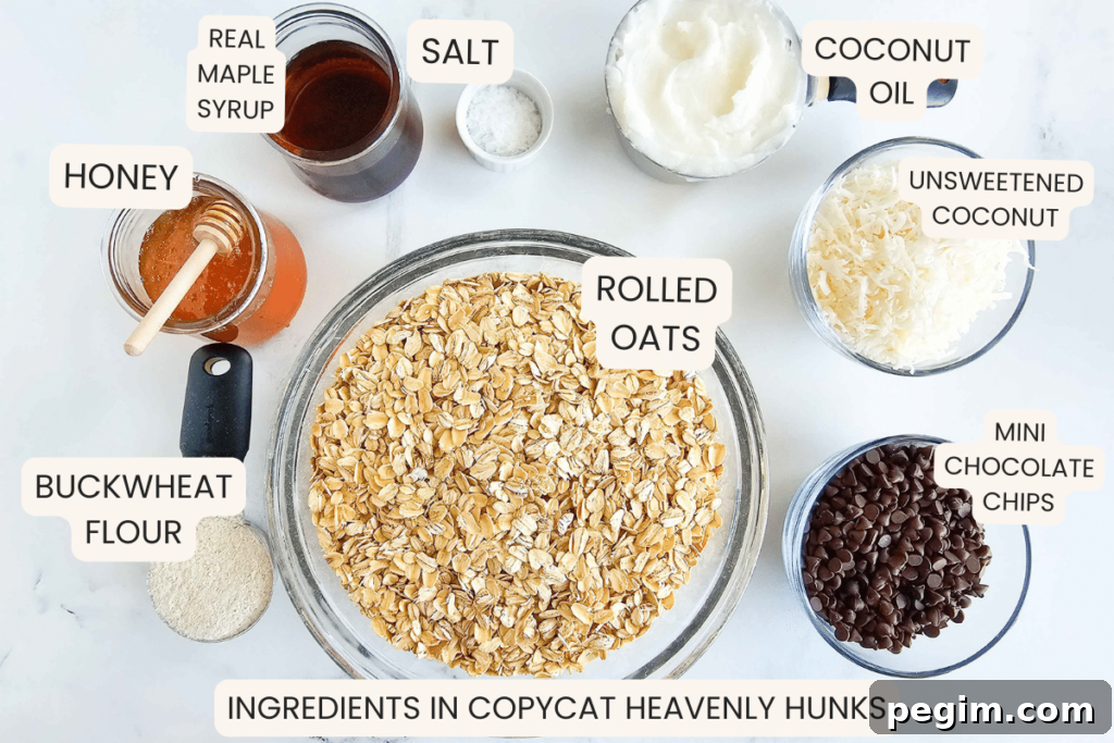 ingredients in Heavenly Hunks recipe: oats, coconut, buckwheat flour, salt, coconut oil, honey, maple syrup, chocolate chips.