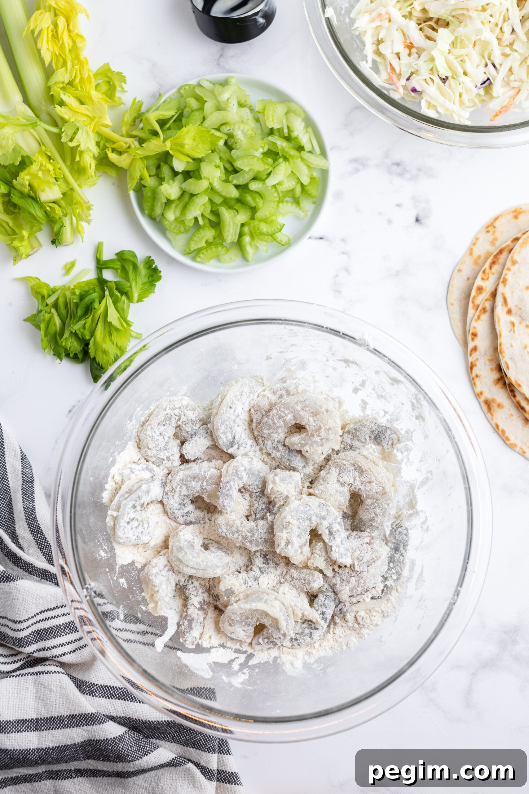Jumbo shrimp tossed in flour.