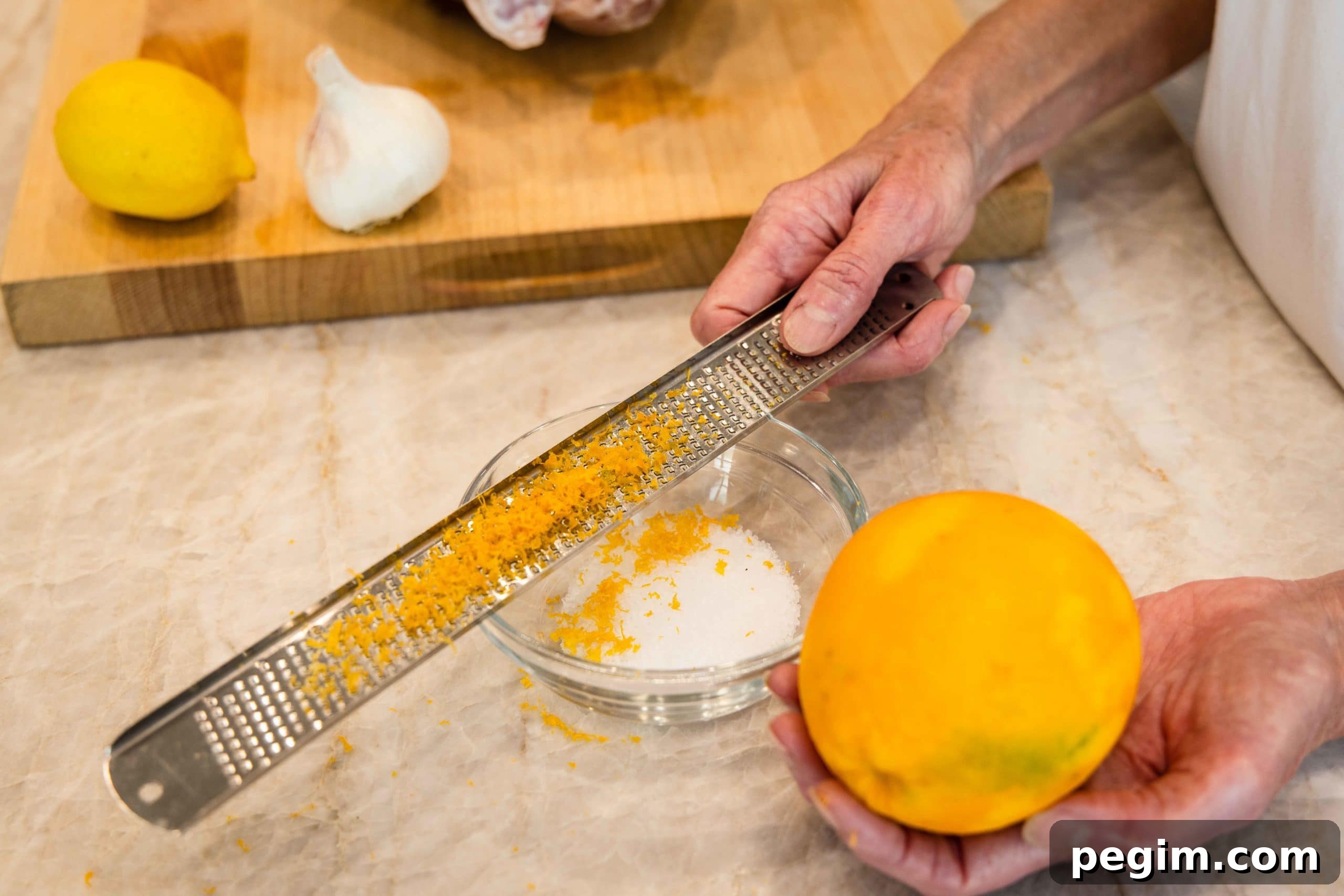 Making the brine, salt and citrus zest.