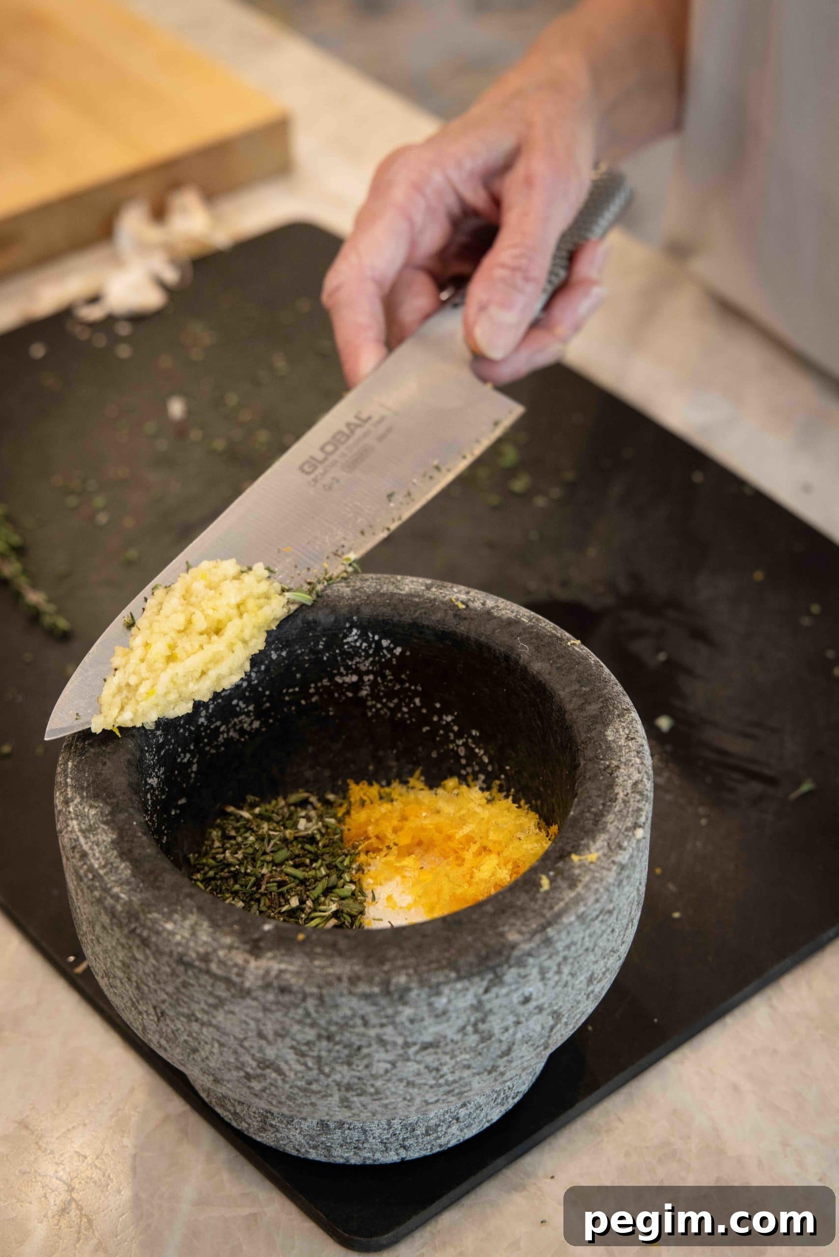Brining ingredients in a pestle for mixing.