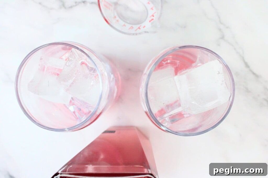 add pink whitney vodka over the ice