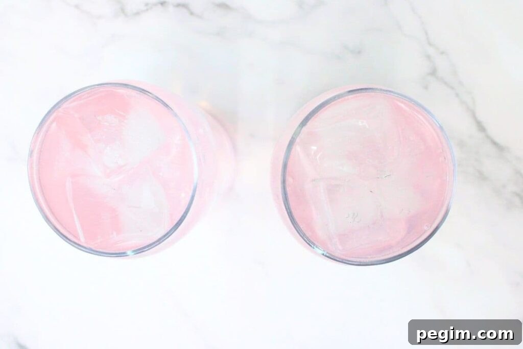 pour sprite over pink whitney vodka