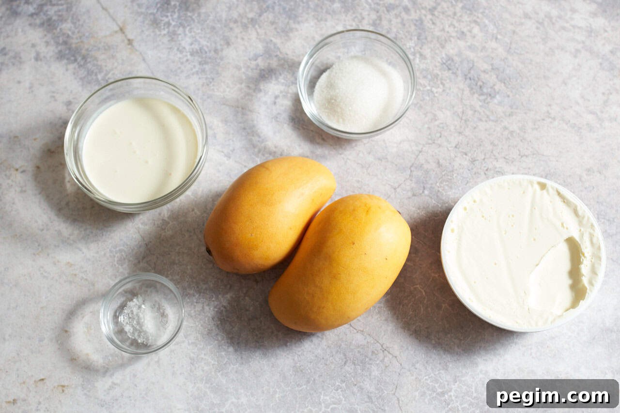 Two mangos, a container of mascarpone cheese, and three small bowls of sugar, cream, and sea salt.