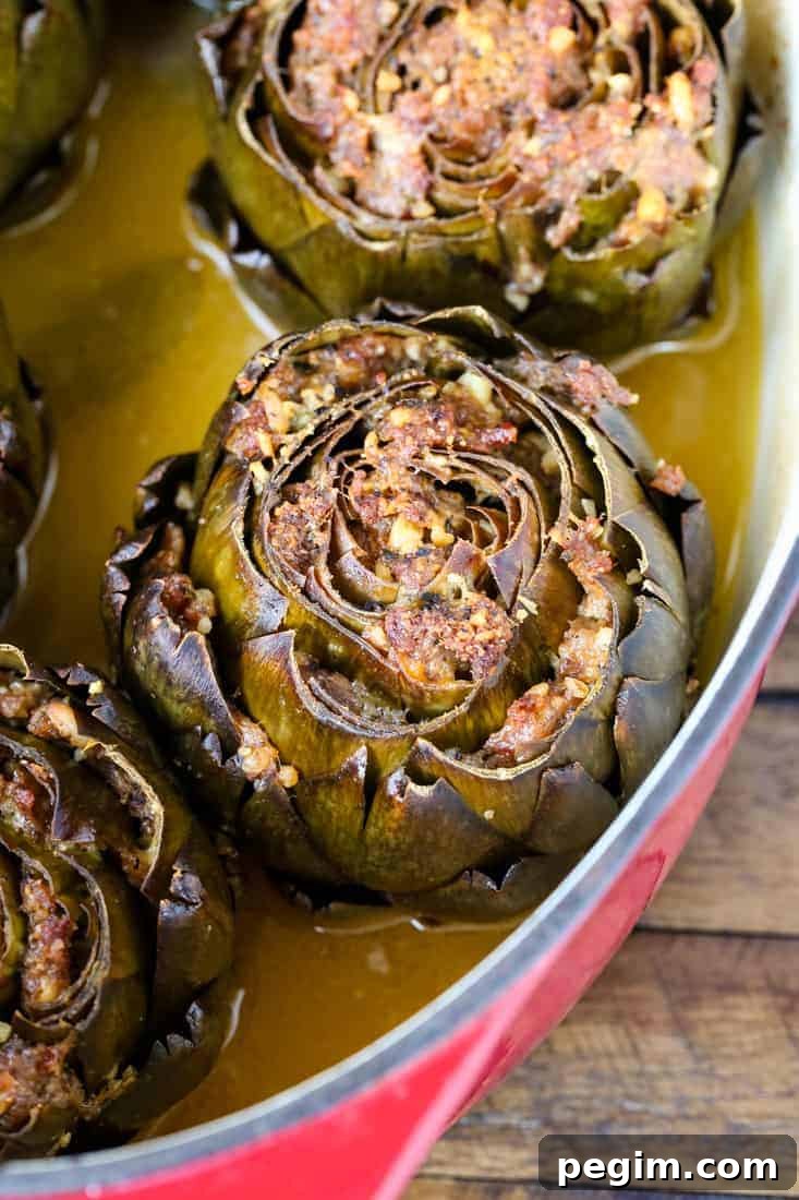 Grandma's Best Stuffed Artichokes are a side dish stuffed with sausage and cheese
