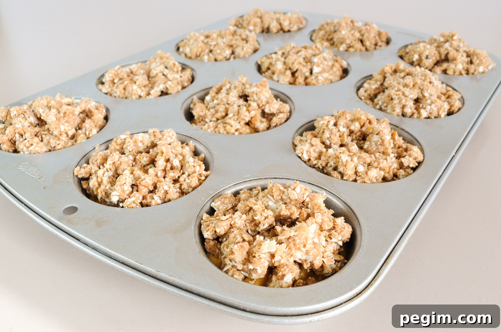 Pumpkin Muffins with Oatmeal Streusel Topping