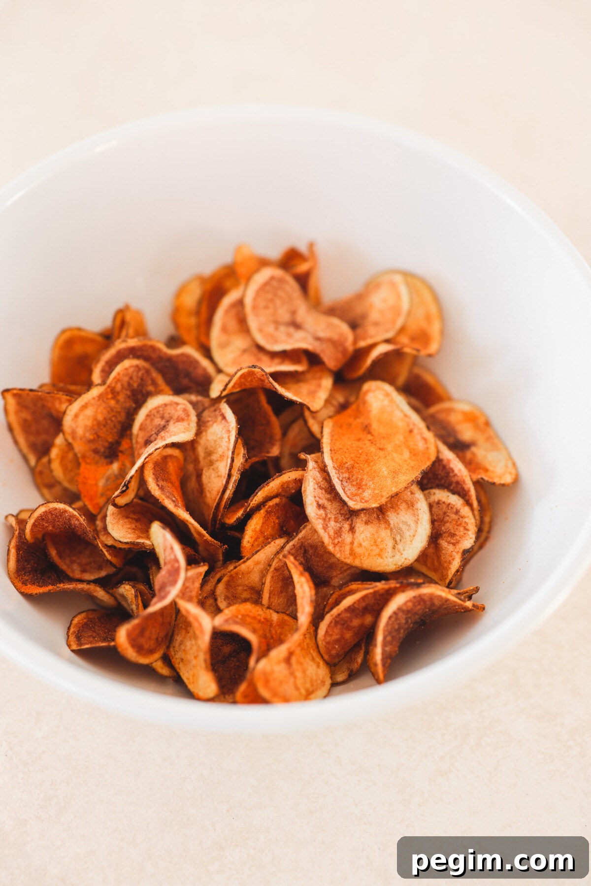 a bowl of spicy potato chips