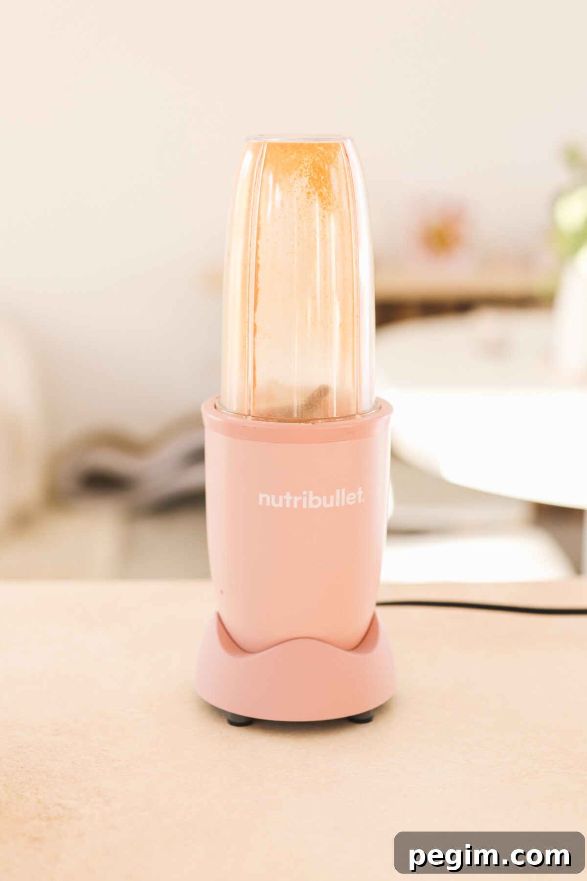 a blender filled with seasonings 