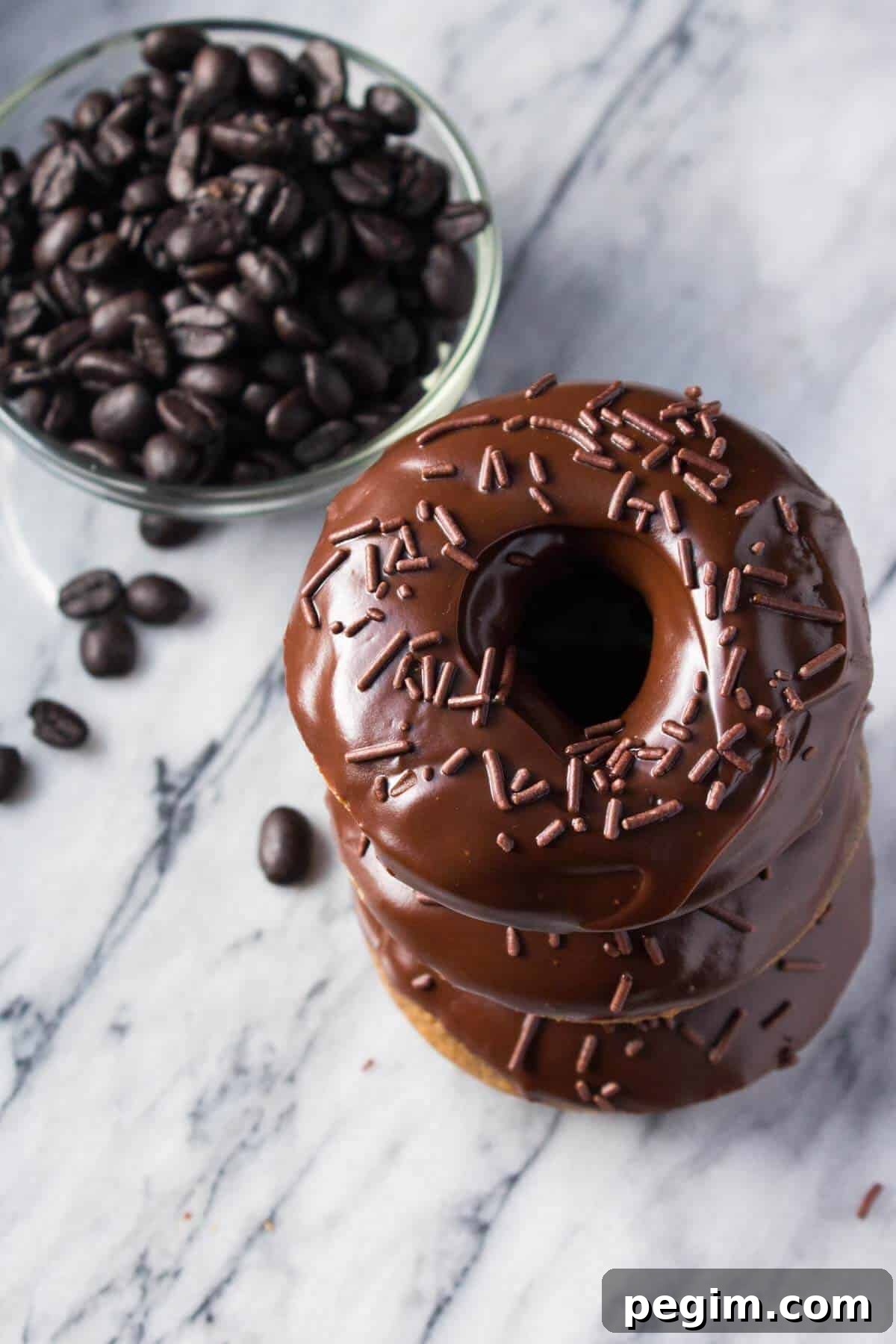 A delicious, coffee-flavored cake doughnut dipped in fudgy, chocolate glaze. These super easy Baked Mocha Doughnuts are the best way to get your morning caffeine fix!