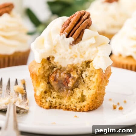 A cupcake on a plate.