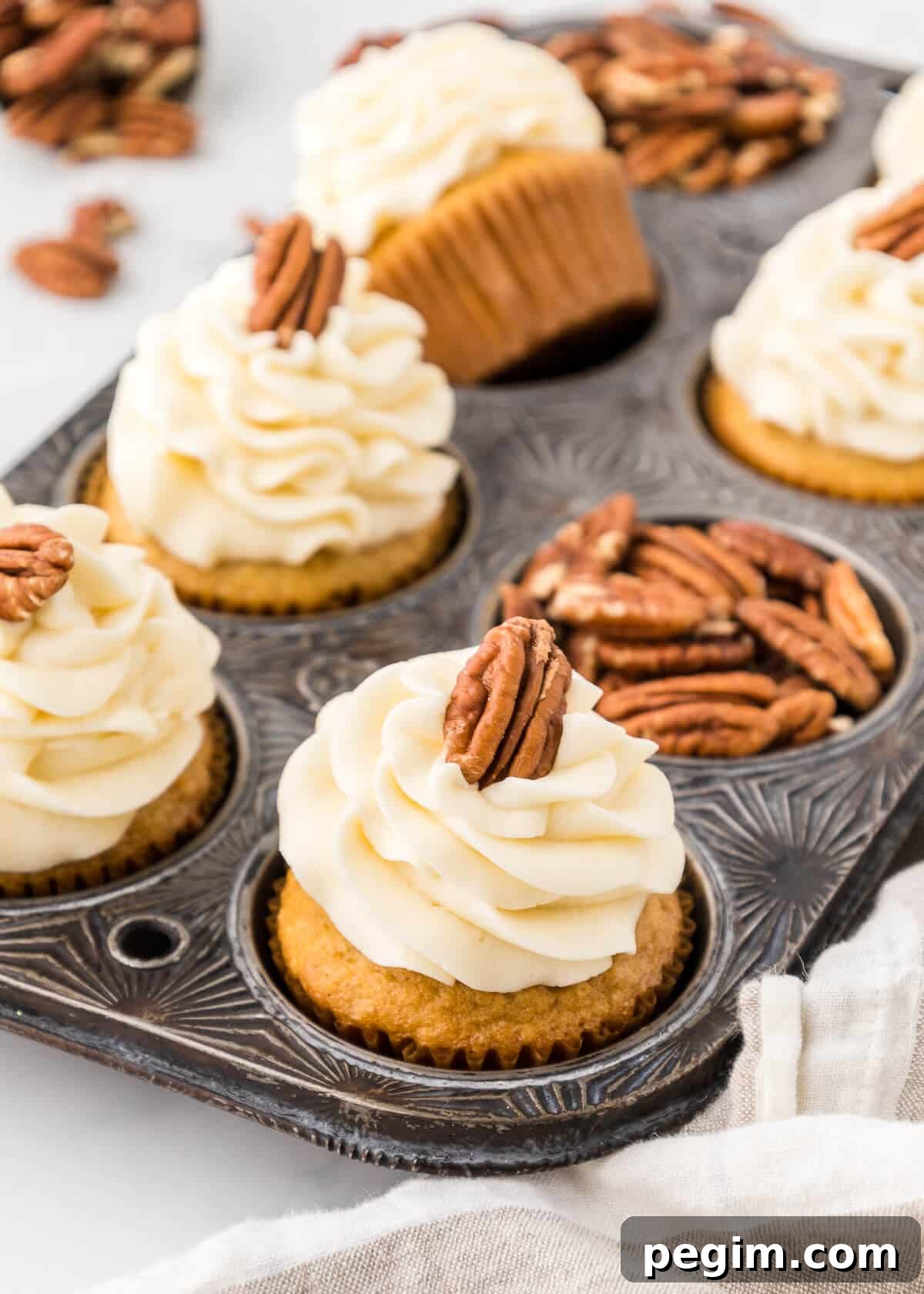 The cupcakes in a muffin tin.