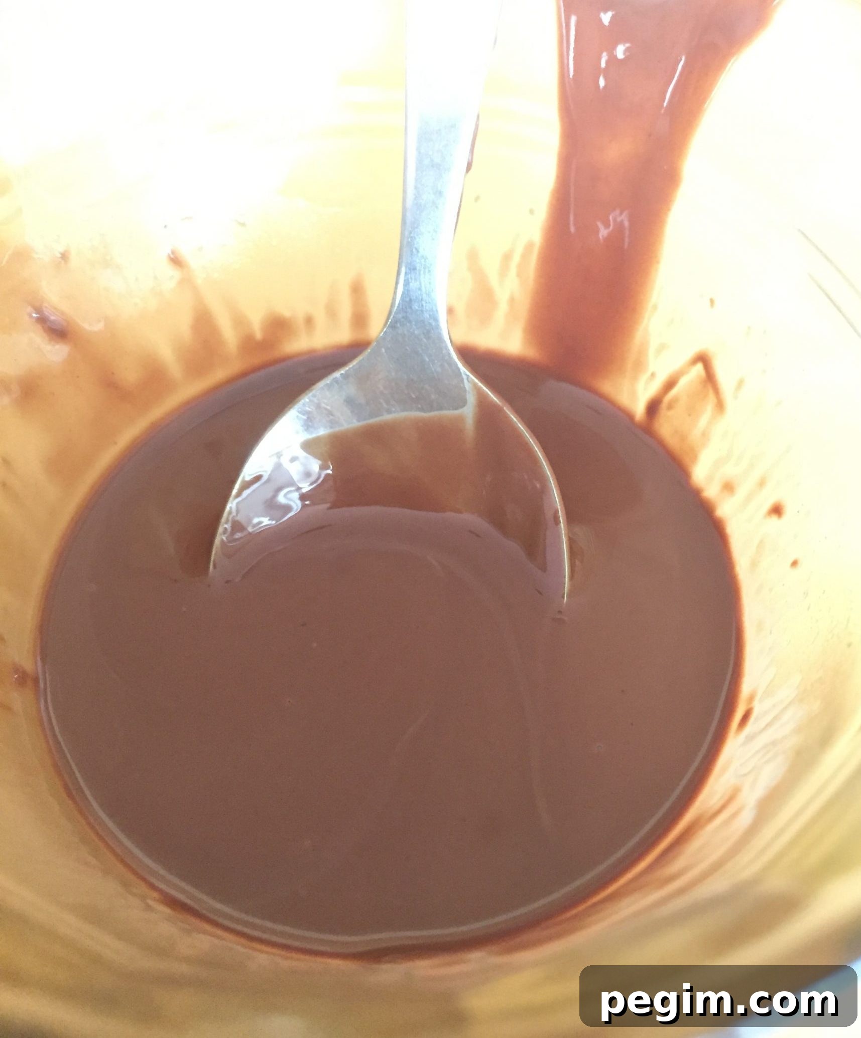 Melted chocolate with coconut oil added before microwaving
