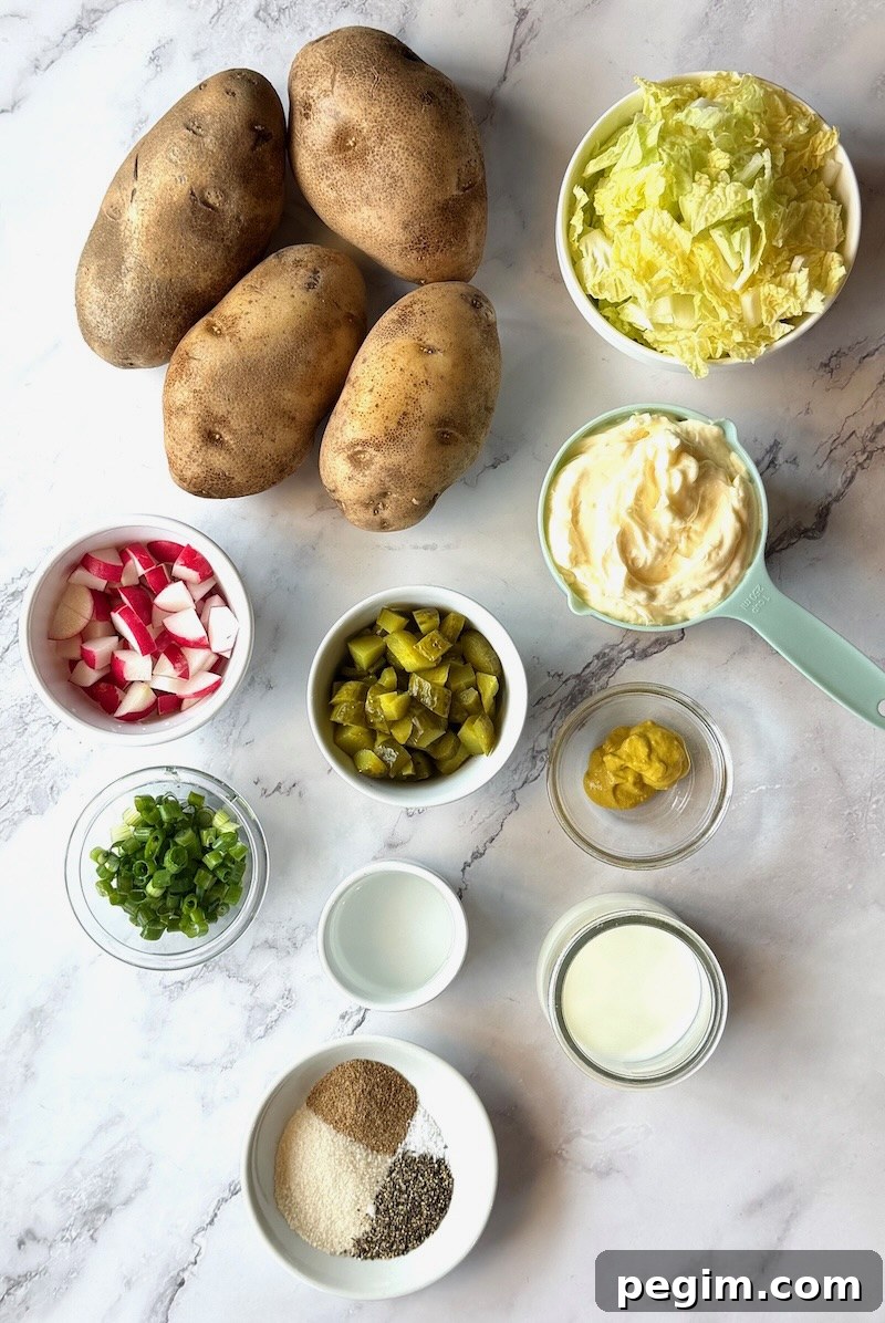 Ingredients displayed for Irish potato salad with cabbage. Russet potatoes, green cabbage, radishes, dill pickles, green onions, mayo, mustard, white vinegar, milk, and pantry seasonings. 