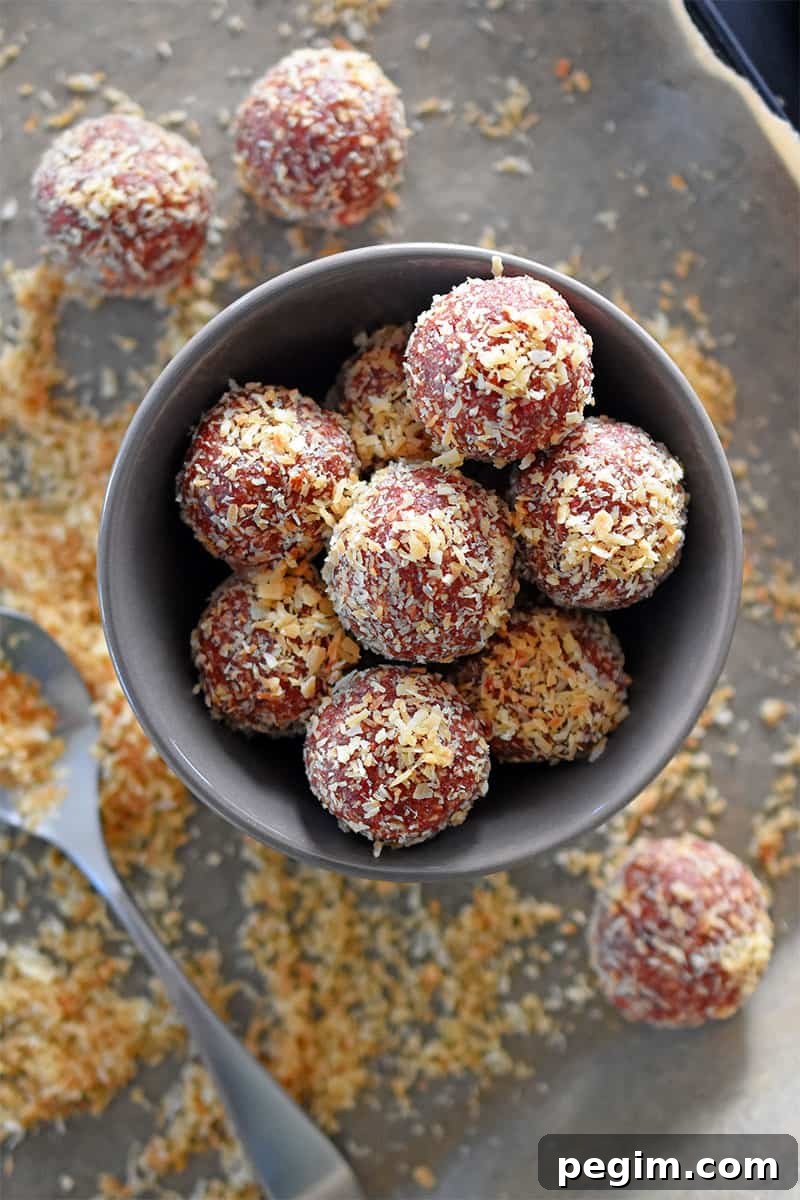An overhead shot of a bowl of “PB&J” Energy Balls