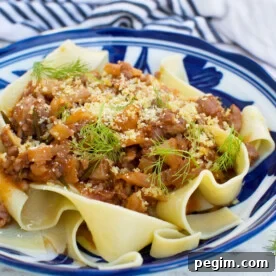 Sausage ragu and pasta on a plate