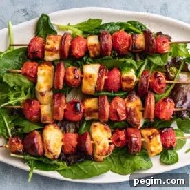 Halloumi kebabs with chorizo and tomatoes