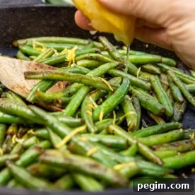 Sautéed frozen green beans in a cast iron pan