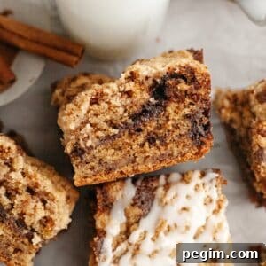 A close up of banana coffee cake, drizzled with a white glaze.