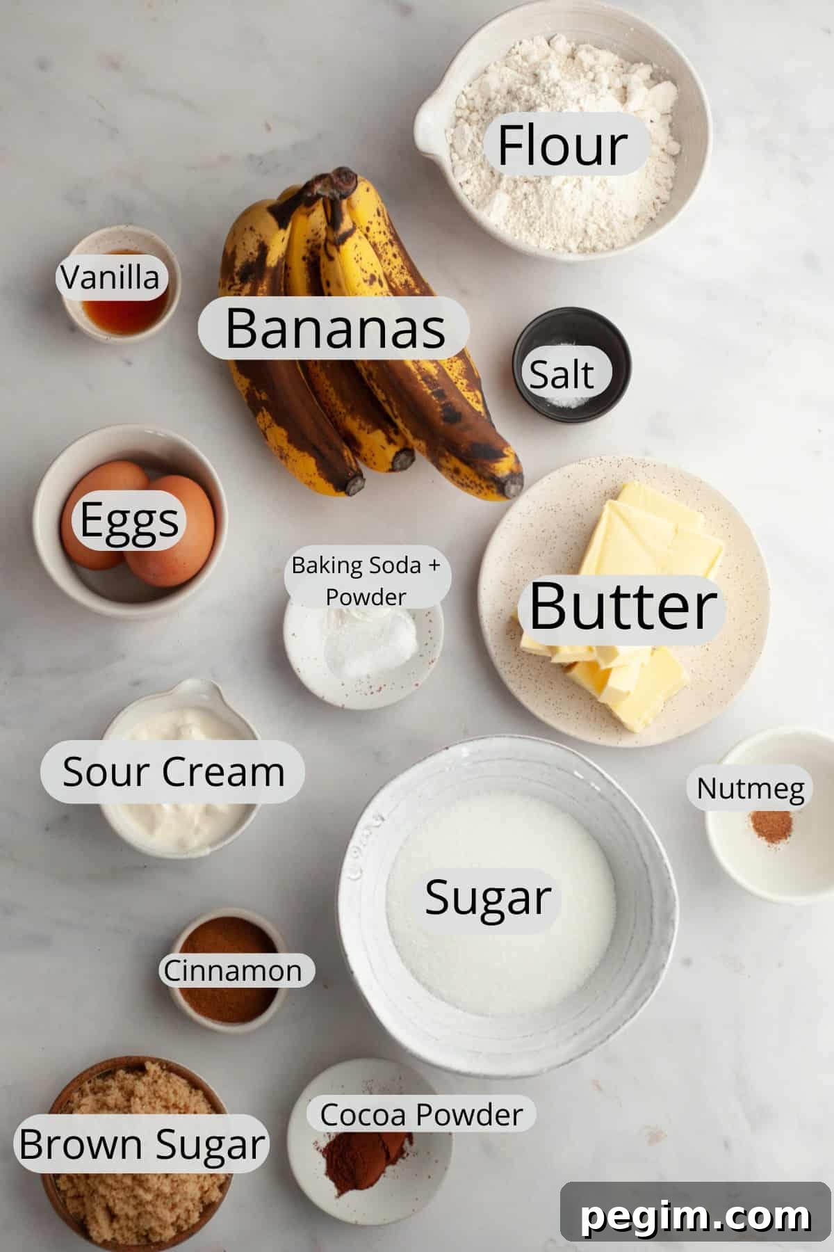 All the ingredients needed to make banana coffee cake, weighed out into small bowls.