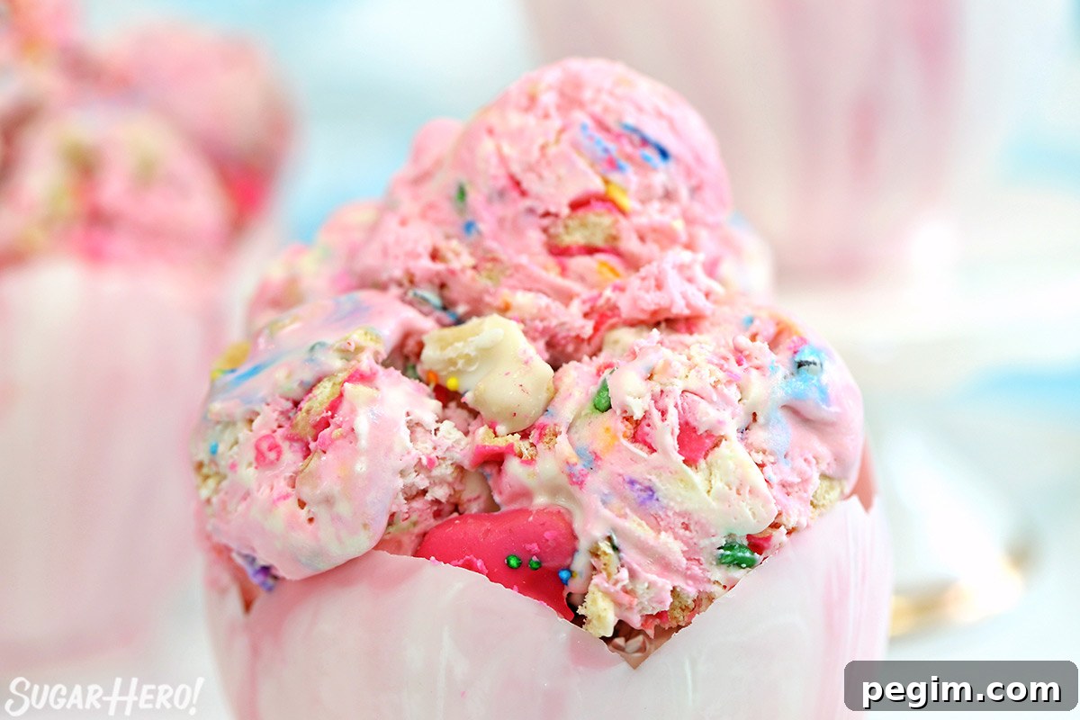 Scoops of Circus Animal No-Churn Ice Cream in a chocolate bowl.