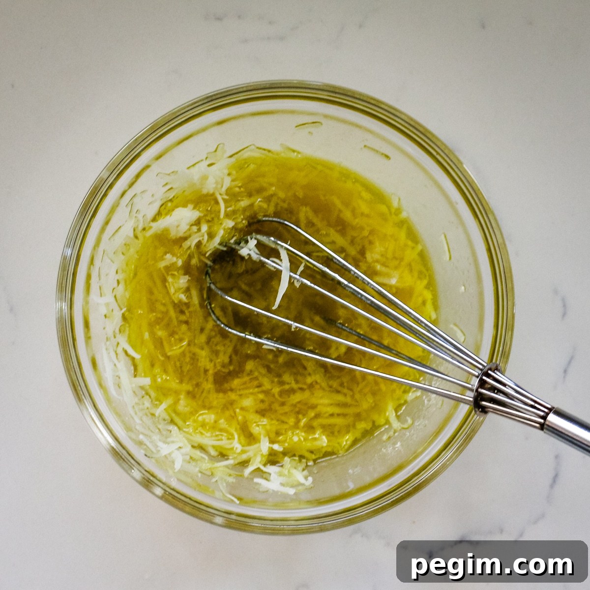 Cheese mixed with olive oil.