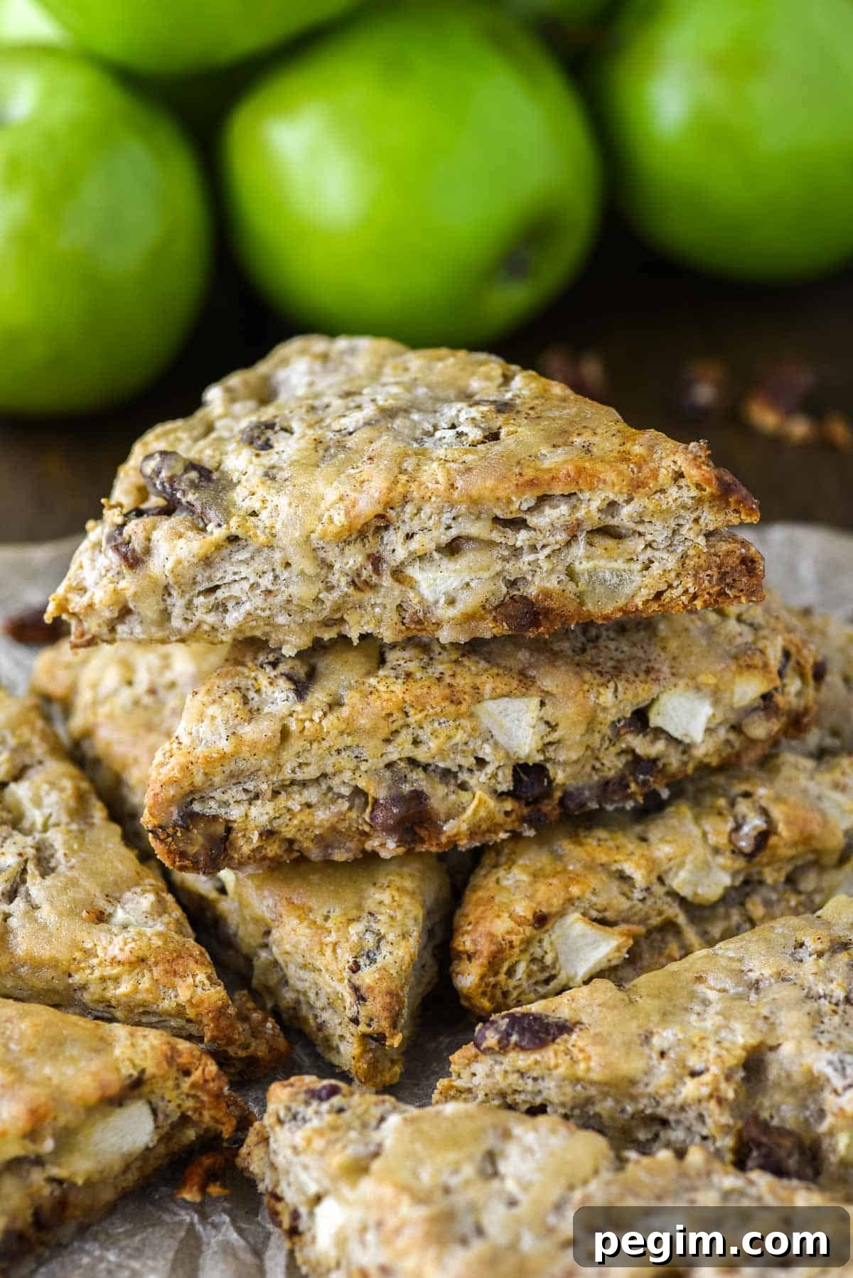 scones with apples and pecans stacked on top of each other