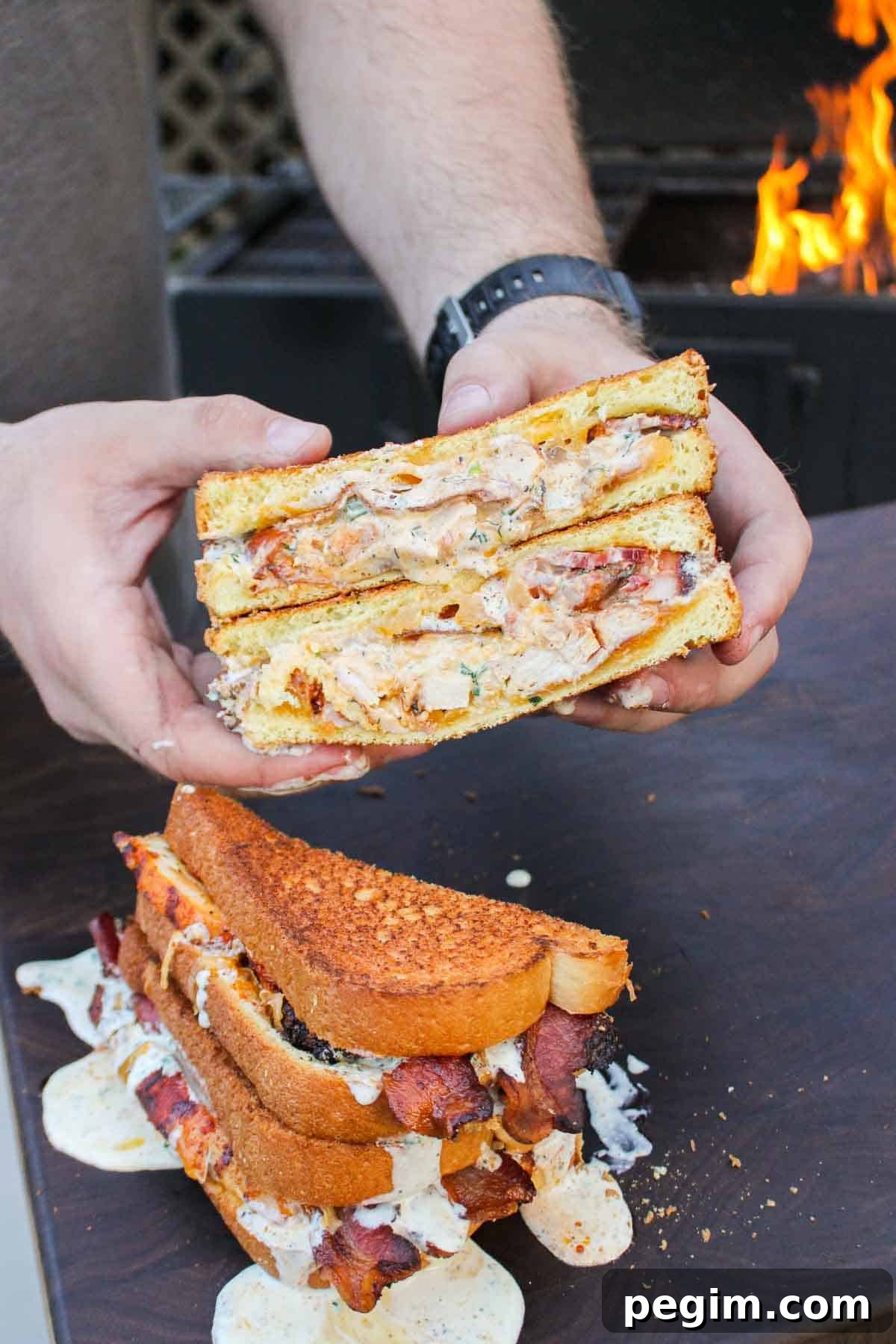 Chicken Bacon Ranch Patty Melt sliced in half so you can see the inside.